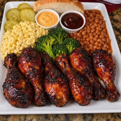 Smoky BBQ Chicken Legs Paired with Classic Sides
